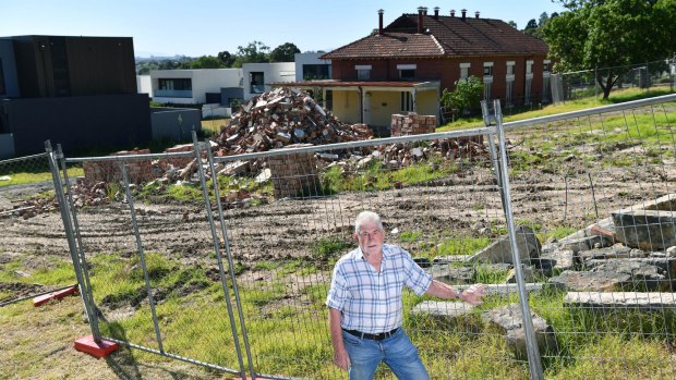 Former boss of the old Kew insitution Max Jackson amongst dilapidated heritage buildings, 