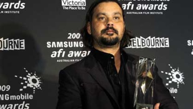 Warwick Thornton with one of his AFI awards for Samson and Delilah.
