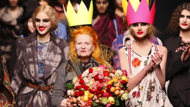 British designer Vivienne Westwood carries a bouquet of flowers at the end of her Fall/Winter 2010/11 women's ready-to-wear fashion show during Paris Fashion Week.