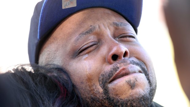 Charles Wakefield cries tears of grief for his 5-month-old daughter Aavielle Wakefield, in Cleveland.