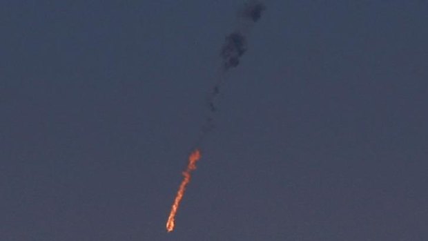 The Syrian fighter jet in flames after it was hit by the Israeli military.