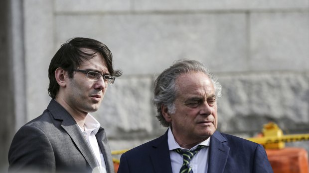 Martin Shkreli as he left court with his attorney Benjamin Brafman on Thursday.