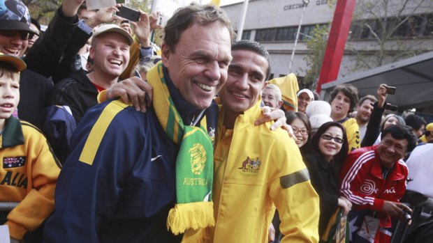 Tim Cahill and Holger Osieck embrace in Sydney.
