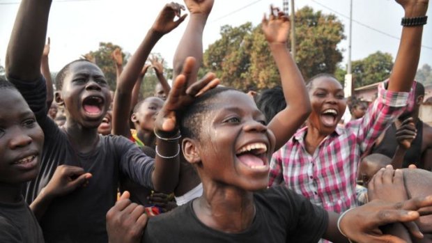 Residents celebrate the election of Bangui's mayor as  interim president of the Central African Republic.