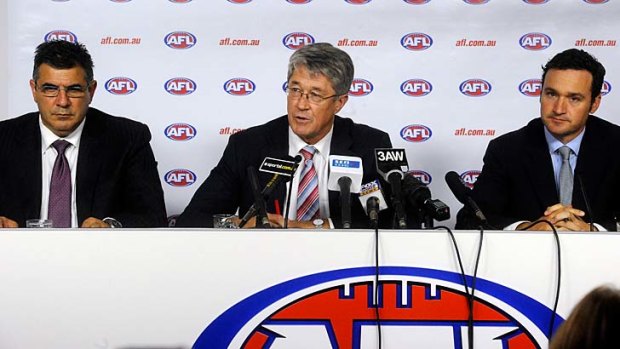 AFL chief executive Andrew Demetriou, chairman Mike Fitzpatrick and operations manager Adrian Anderson speak to the media.