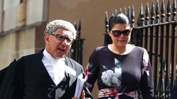 Katherine Abdallah and her barrister Gregory Stanton arrive at the NSW Supreme Court on Thursday. 