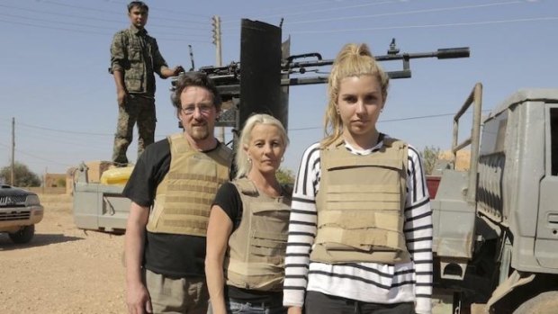 War zone ... Kim Vuga, centre, with Andrew Jackson and Nicole after their close call with Islamic State.