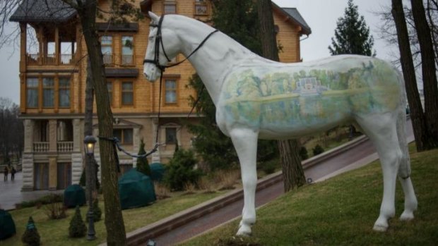 An ornamental horse outside the abandoned presidential residence.