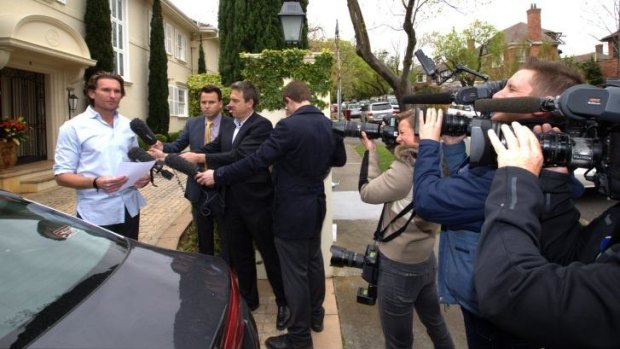 James Hird fronts the media outside his Toorak home.