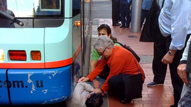 The victim trapped under the tram in Sydney's Chinatown.