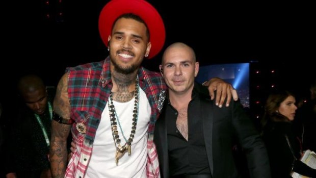 Chris Brown with Pitbull in November last year.