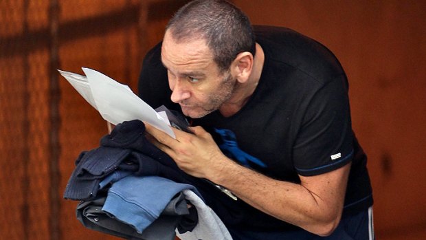 'Ice' flight ...Qantas airline steward Samuel Kaufman leaves the Melbourne Magistrates Court.