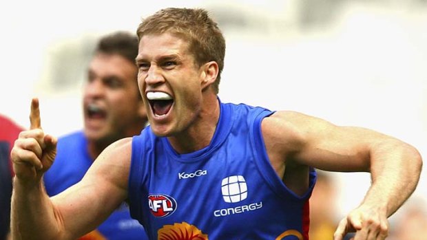 Playing on: Luke Power has vowed to continue his AFL career for as long as possible.