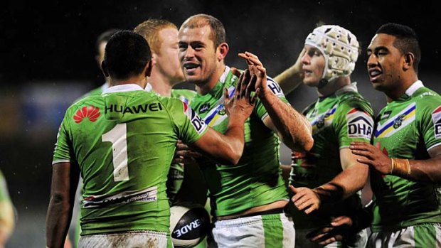 Terry Campese celebrates with teammates.