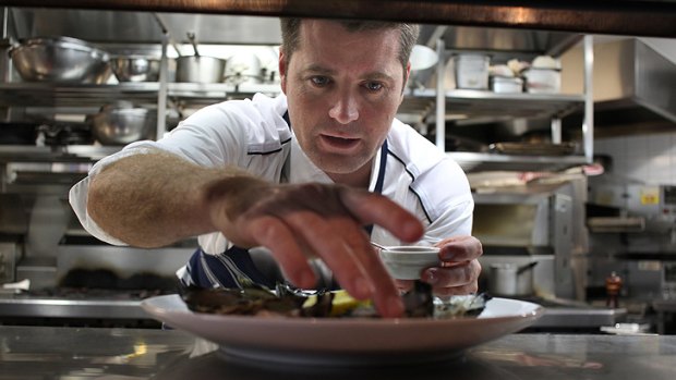 Almonds, activate! ... Chef Pete Evans in action in the kitchen.