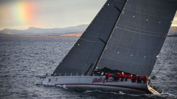 Riding high: Wild Oats XI sails up the Derwent to line-honours victory in record time on Friday.