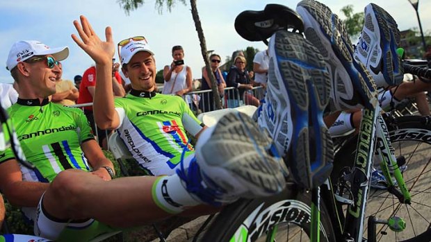 Peter Sagan of the Cannondale team waves to the fans on Thursday as he and his teammates await the presentation of teams for the 100th Tour de France.