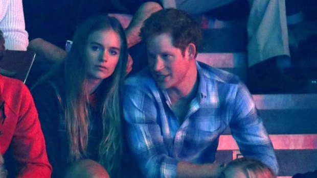 Split: Prince Harry and Cressida Bonas at Wembley Arena in March.