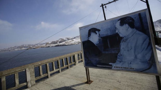 Allies &#8230; a picture of Mao Zedong and North Korea's late leader Kim Il-sung on the Hekou Bridge linking China and North Korea.