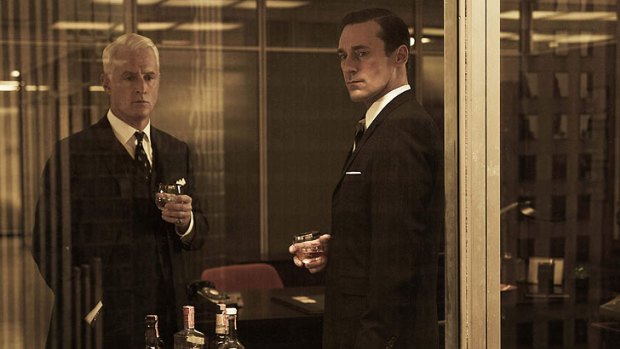 Roger Sterling (John Slattery, left) is increasingly indolent, while times have changed for Don Draper (Jon Hamm) in the fifth season of <i>Mad Men</i>.