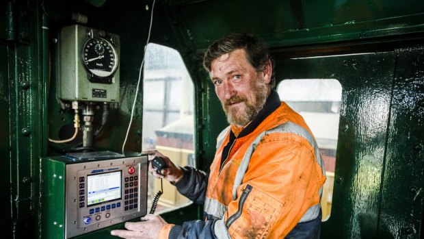 Shaun Barker with the in-cab communications equipment radio fitted to the Beyer-Garratt.