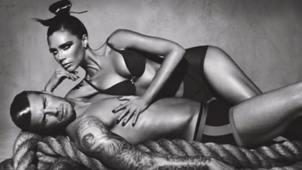 Model love ... Victoria and David Beckham pose for Armani.