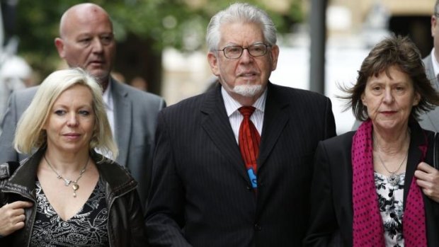 Australian entertainer Rolf Harris arrives at Southwark Crown Court with daughter Bindi on Tuesday.