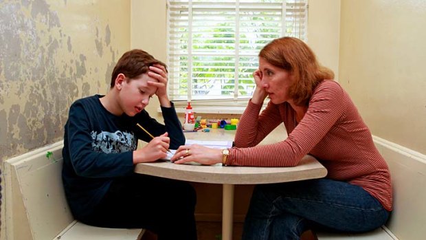 Practice makes perfect: Jane Whitelaw with her son George, 11, studying at home for the NAPLAN tests.