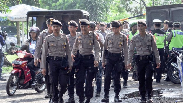 Soldiers and police arrive at Cilacap, the port of departure for Nusakambangan, where the executions will take place.