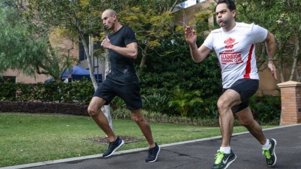 Fitzy and Wippa practise running for the City2Surf. 