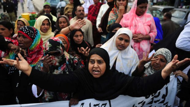 Anger ... polio vaccination workers protest against the killing of their colleagues in Karachi on Wednesday.