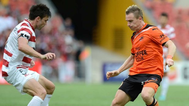 On the attack &#8230; Besart Berisha faces Michael Beauchamp in defence for the Western Sydney Wanderers on Sunday.