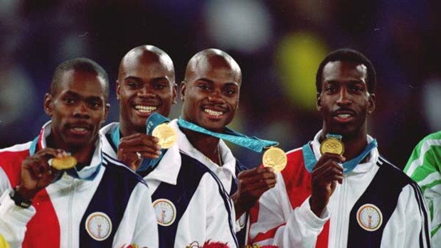 Shame ... US legend Michael Johnson, far right, handed back his 4x400m gold medal after teammates Alvin Harrison, second from left, and Calvin Harrison, third from left, received drugs bans, while Antonio Pettigrew, far left, admitted to doping.