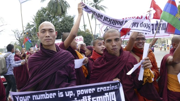 Buddhist monks  on Wednesday protesting in Yangon against the government's decision to allow some residents without full citizenship to vote in a referendum.