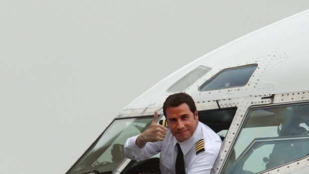 John Travolta in the cockpit of his Boeing 707 in 2002.