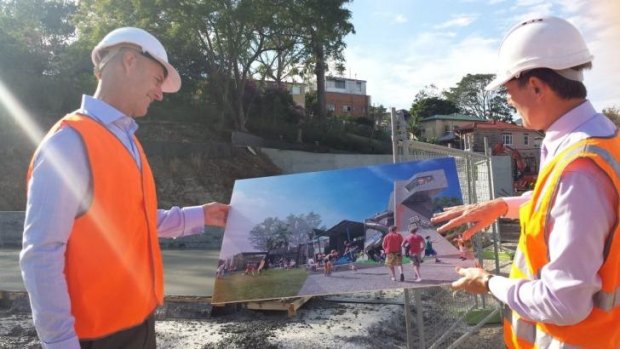 Tennis Queensland chief executive Cameron Pearson and Brisbane Lord Mayor Graham Quirk look over plans for the new tennis centre at Frew Park, Milton.