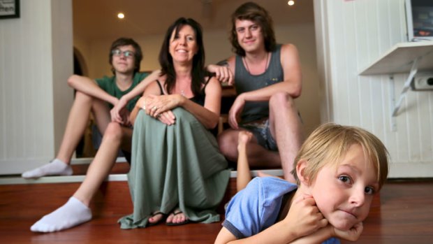 Jen Borrelli with her children (from left) Ben, 15, Dan, 20 and Daniel, 6, who has been in her care since he was three days old.