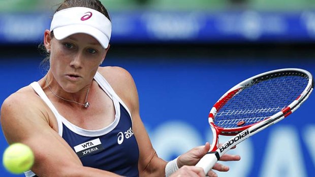 Samantha Stosur in action during her quarter final match against Maria Sharapova at the Toray Pan Pacific Open in Tokyo.