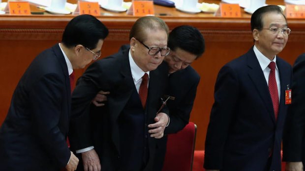 Unrelenting leadership &#8230; the Chinese President, Hu Jintao, left, helps former president Jiang Zemin to his seat at the opening of the Communist Party Congress at the Great Hall of the People.