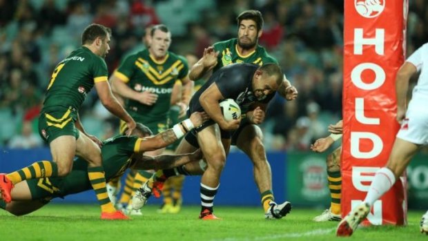 Moa better: Kiwi prop Sam Moa charges over for a first-half try.