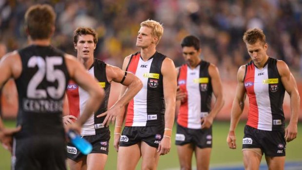 St Kilda walks off after losing to Richmond at the MCG.