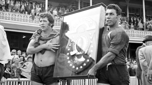 Glory days: John Sattler (right) on South Sydney's lap of honour in 1971.