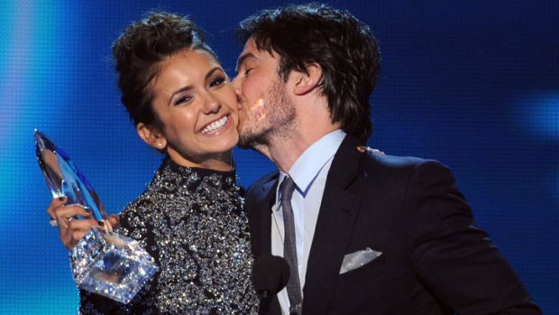 Not awkward: Actors Nina Dobrev (L) and Ian Somerhalder, winners of the favorite onscreen chemistry award for <i>The Vampire Diaries</i>, joked about their offscreen break-up.