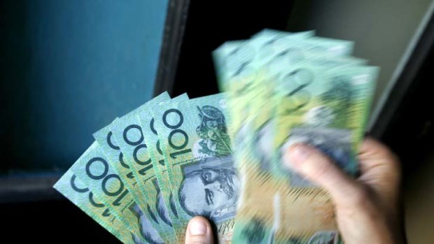 Money bags ... the average Australian has access to nine $100 notes, up from eight three years ago.