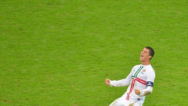 Portuguese forward Cristiano Ronaldo celebrates getting his team to the Euro 2012 semis.