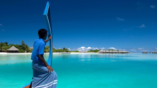 Dhoni approaches Conrad Maldives Rangali Island.