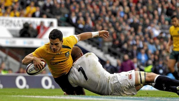 Matt Toomua crashes over for the Wallabies' only try against England.