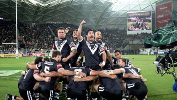 Come one, come all ... New Zealand perform the haka before their clash with the Kangaroos on a wet night at AAMI Park.