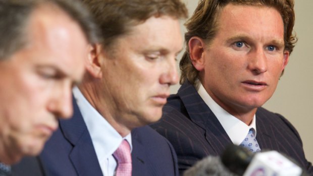 James Hird, right, fronts the media on Tuesday.