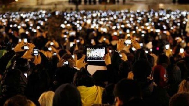 Smartphones were at the ready as people gathered in St Peter's Square to await the arrival of Pope Francis.